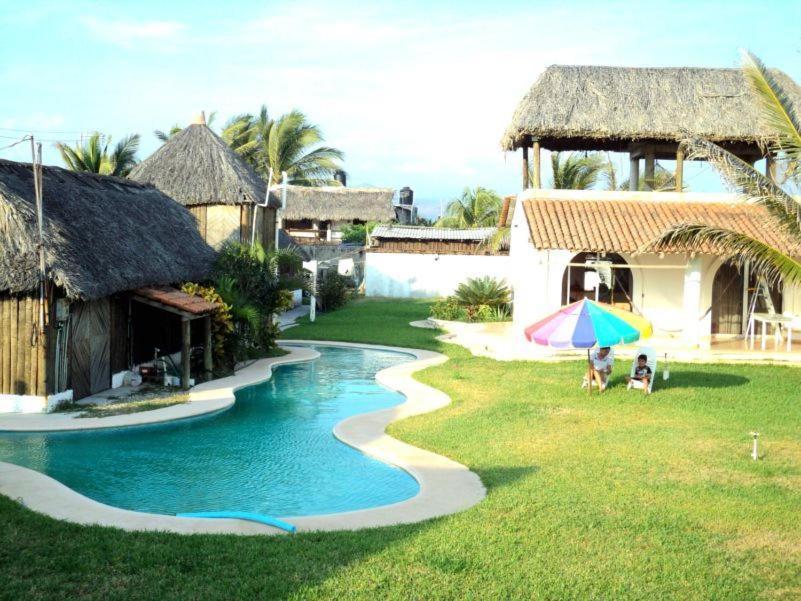 Cabanas Pie De La Cuesta Hotell Coyuca Rom bilde